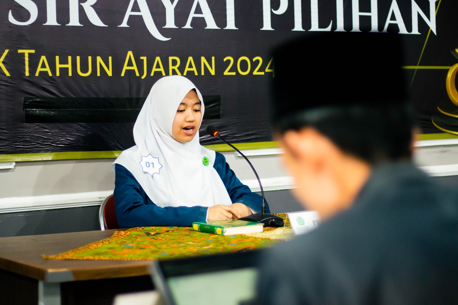 PELAKSANAAN KEGIATAN SIDANG MUNAQOSAH TAHFIDZ QUR'AN DAN TAFSIR AYAT PILIHAN KELAS IX